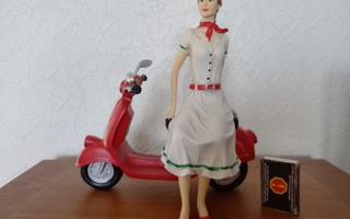 Tyttö ja skootteri vintage figuuri