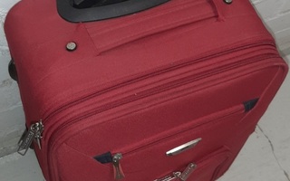 Punainen lentolaukku matkalaukku