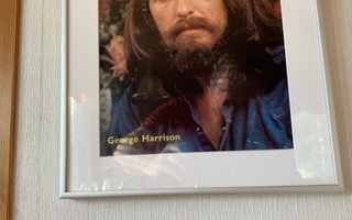 George Harrison -juliste kehystettynä