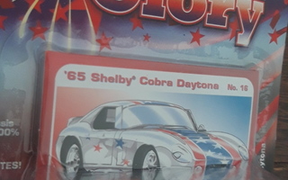 Johnny Lightning 1 64 1965 Shelby Cobra mint