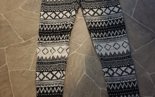 Valko/musta-kuvioidut leggingsit, koko 140/146 cm