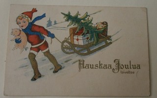 Tonttu vetää joulukelkkaa porsas sylissä, k. 1926