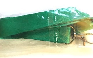 Vihreä avainnauha Avaamaton paketissa