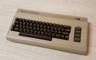 Commodore 64 -kotitietokone (varaosiksi tms)
