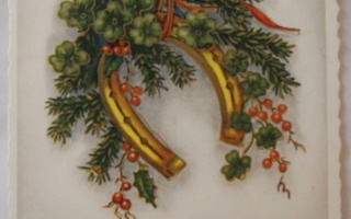 Hevosenkenkä koristeltu oksin ja marjoin