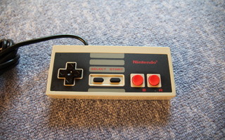 NES : Ohjain [huollettu] - Aito Nintendo tuote [SCN]
