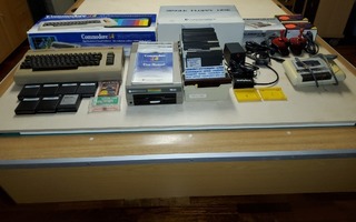 Commodore 64 + 1541 + 8 modulia + Sav64 + uusioPS + lisäys
