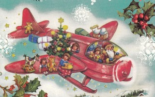 Joulupukki ja pikkuenkelit matkaavat lentokoneella