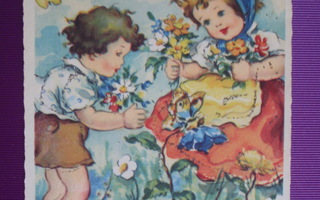 Lapset keräävät äidille kukkia