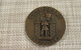 Uusi Suomi mitali 1847-1947  /Gerda Qvist 1947