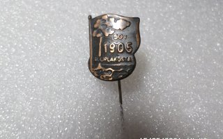 50  vuotta  Suurlakosta   1905  Neulamerkki  Komea