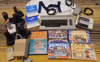 Commodore 64 + kassi, joystikkeja ja pelejä ym.