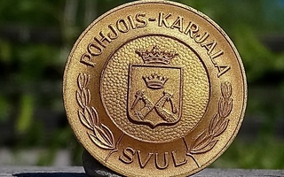 Kullanvärinen Pohjois- Karjala merkki vuodelta 1975, Halkais