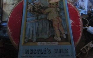 Peltikyltti Nestle maitomainos. Pikkutyttö ja terrieri