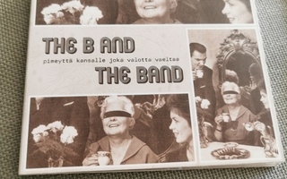 The B And The Band – Pimeyttä Kansalle Joka Valotta Vaeltaa