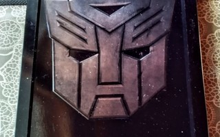 2- DVD, Metalli-Boksi, Transformers Protect / Destroy