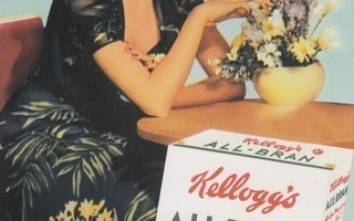 Mainos Kellogg's nainen pöydän ääressä (isokok. kortti)