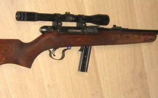 .22LR Concorde puoliautomaatti sekä asekaappi