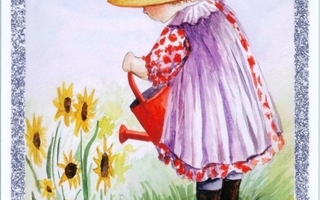 Tyttö kastelee auringon kukkia