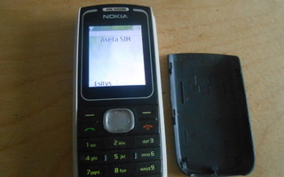 Nokia 1650 + akku ja laturi, toimii.