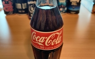 2002 valmistettu täysi Coca-Cola pullo