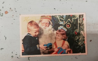 Vanha postikortti ( joulupukki ja lapset )