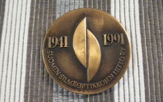 Suomen Silmäoptikkojen Liitto ry.1941-1991 50 V.