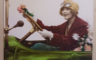 Nuori leidi autoilee viemään kukkia, 1920-luku, k. k-k