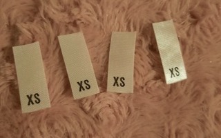 XS kokomerkki
