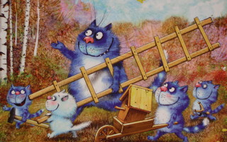 Irina Zeniuk siniset kissat laittamassa linnulle pönttöä