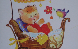 Katarina Babok kissa lastenvaunuissa