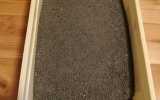 Mustaa/tummanharmaata hienoa hiekkaa  n. 1  kg.