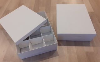 Kaksi Ikean Tjena-säilytyslaatikkoa