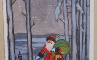 Joulupukki tarpoo yöllisessä metsässä (sign. TI), p. 1937