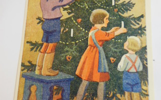 Vanha kortti Lapset koristelevat kuusta