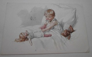 Tyttö leikkii vuoteessa leluillaan, vanha väripk, p. 1922