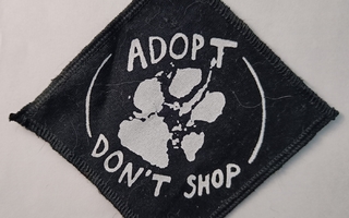 Adopt don't shop-kangasmerkki