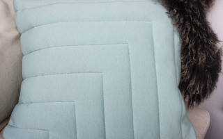 Tyynynpäällinen turkoosi puff tikattu 50 x 50