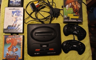 Sega Mega Drive II,  2 ohjainta ja 4 peliä