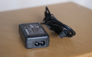 == Olympus F-1AC Battery Adapter/Charger