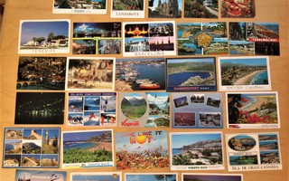 29 kpl Ulkomaiset postikortit merkein