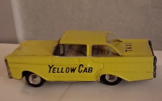 Vanha peltiauto Yellow Cab taxi Made in Japan .