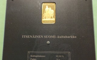 10 g 9999 kulta harkko. Suomi neito ja leijona. Kansiossa.