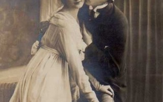 RAKKAUS / Mies antaa ujolle tytölle poskisuudelman. 1900-l.