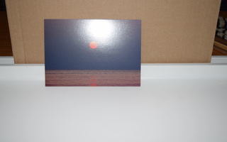 postikortti aurinko horisontissa