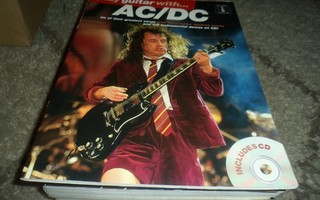 AC/DC paly guitar with.
