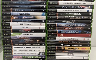 Xbox-konsoli + 2 ohjainta + paljon pelejä