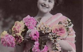 NAINEN / Nuori nätti tyttö kukkia kädessään. 1900-l.