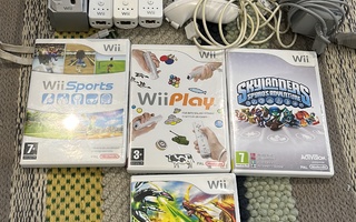 Wii konsoli + 4 peliä + kolmet ohjaimet