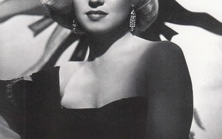 Marilyn Monroe, aurinkokuvio taustalla